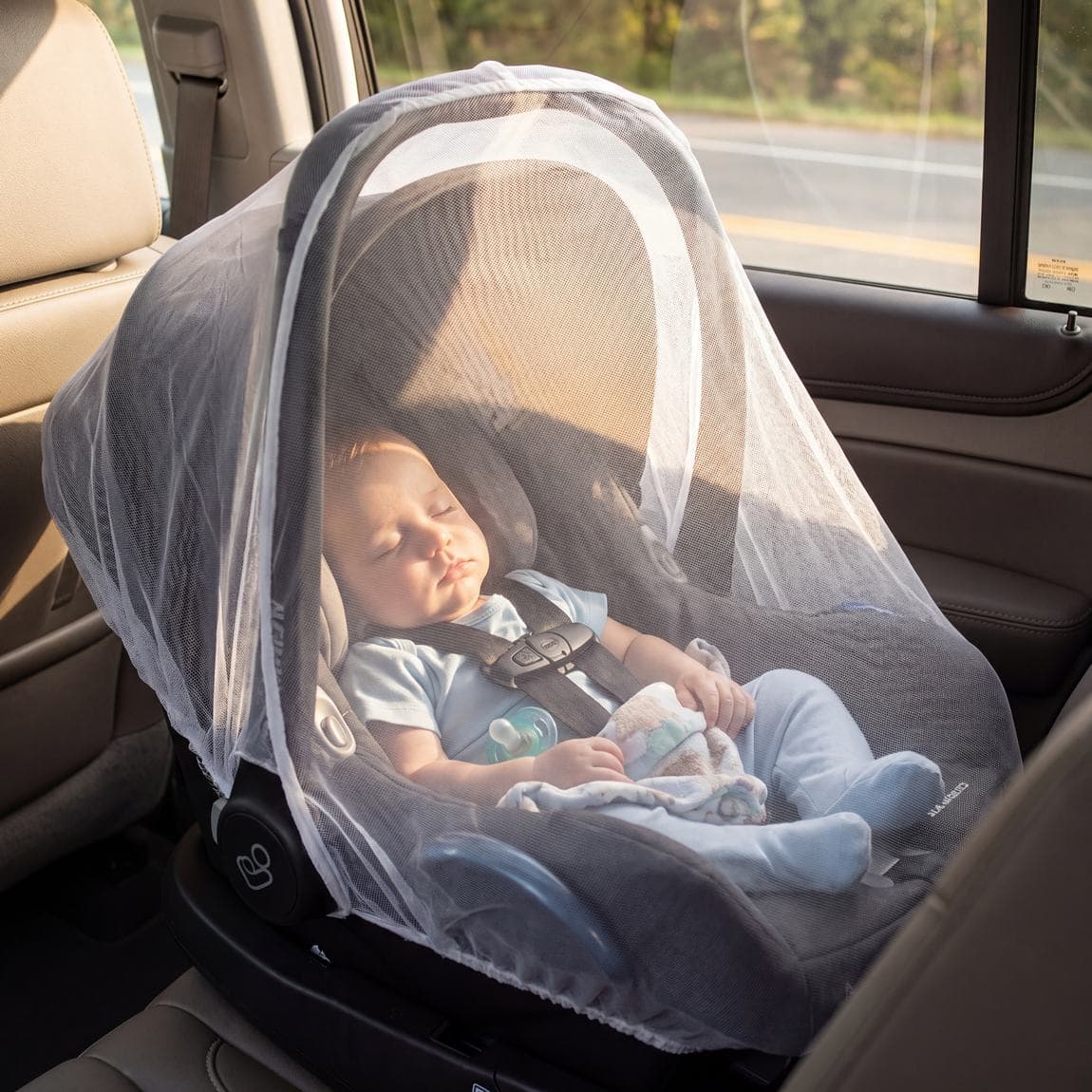 Bambino Carello pram net fitted to a buggy